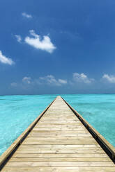 Wooden Jetty out to tropical Sea, The Maldives, Indian Ocean, Asia - RHPLF31739