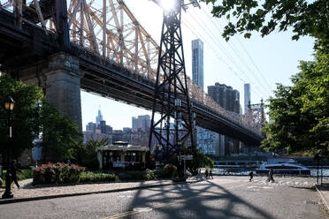 View of the Queensboro Bridge, a cantilever bridge over the East River connecting Long Island City in Queens with East Midtown and Upper East Side neighborhoods in Manhattan, passing over Roosevelt Island, New York City, United States of America, North America - RHPLF31989