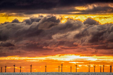 Sunset view from Walney Island across the Irish Dea towards the distant Walney Offshore Wind Farm, Cumbrian Coast, Cumbria, England, United Kingdom, Europe - RHPLF32036