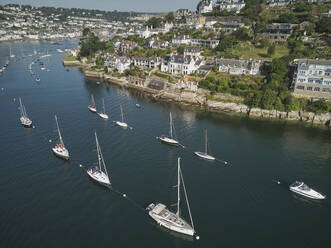 An aerial view into the mouth of the River Dart, with Kingswear nearest, towards the right, and Dartmouth in the distance, south coast of Devon, England, United Kingdom, Europe - RHPLF32113