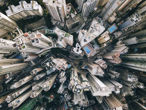 Modern buildings with winding road in Hong Kong city - MMPF01168