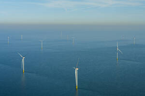 Netherlands, North Holland, IJmuiden, Aerial view of newly constructed offshore wind farm in North Sea - MKJF00010