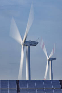 Solar panels and spinning wind turbines - JATF01385