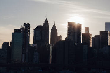 USA, New York State, New York City, Skyline of Manhattan at sunset - NGF00821