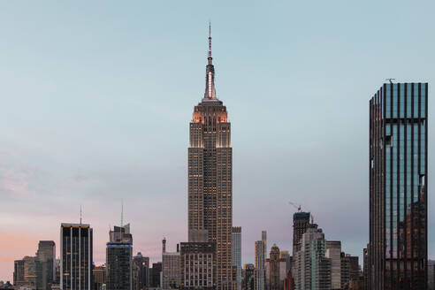 USA, New York State, New York City, Aerial view of Empire State Building at dusk - NGF00825