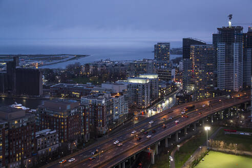 Canada, Ontario, Toronto, Aerial view of traffic on elevated city road at dusk - NGF00831