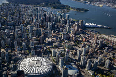 Canada, British Columbia, Vancouver, Aerial view of BC Place stadium and surrounding skyscrapers - NGF00834
