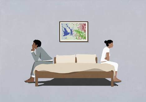 Frustrated couple sitting back to back at opposite edges of bed - FSIF06937