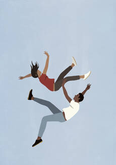 Couple falling midair against blue sky - FSIF06965
