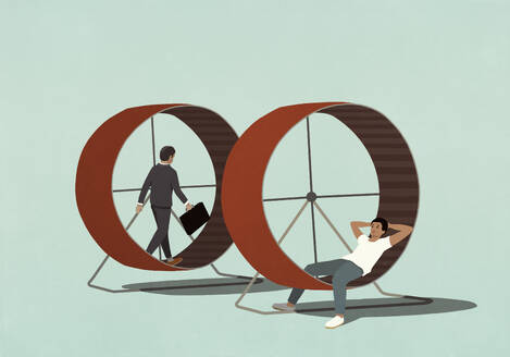 Businessman walking on hamster wheel next to man relaxing in hamster wheel - FSIF06971