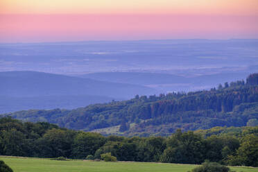 Germany, Bavaria, Forested hills along High Rhon Road at dawn - LBF03887