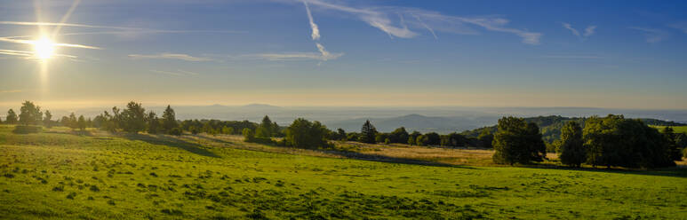 Germany, Bavaria, Panoramic view of landscape along High Rhon Road at sunrise - LBF03890