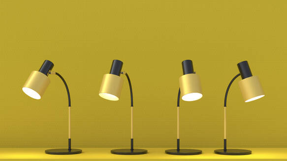 3D render of yellow desk lamps glowing against yellow background - UWF01599