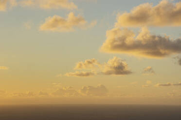 USA, United States Virgin Islands, St. John, Clouds over Caribbean Sea at sunrise - TETF02537