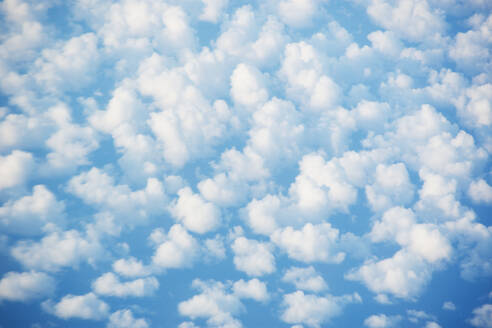 White cumulus clouds against blue sky - TETF02542