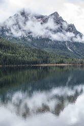 USA, Idaho, Clouds covering Sawtooth Mountains at Stanley Lake - TETF02569