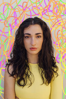 Young woman with scribbles against colored background - EGHF00857