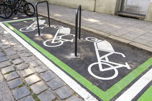 Symbols of bicycle parking on road at station - MAMF02956