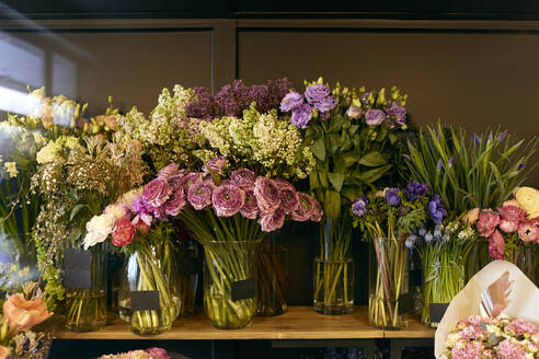 Various flowers on table at flower shop - SANF00212