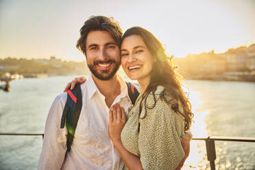 Happy couple in front of Douro river at Porto, Portugal - BSZF02697