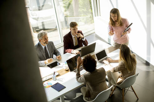 Group of multiethnic business people working together in the office - INGF13162