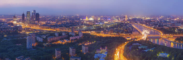 Aerial panoramic view of Moscow financial district with skyscrapers at dusk along Moskva River, Moscow, Moscow Oblast, Russia. - AAEF26107