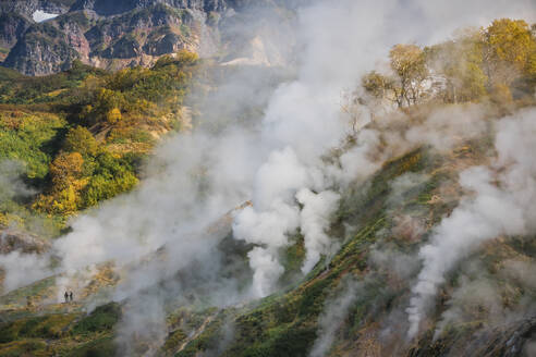 Aerial view of Dolina Geyzerov, a volcanic caldera and geothermal area with hot spring water in Valley of Geysers, Kamchatka Krai peninsula, Russia. - AAEF26154