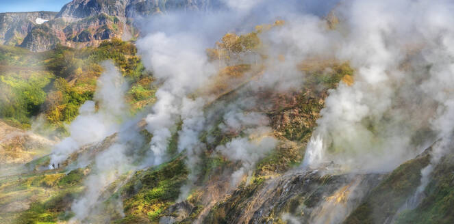 Aerial view of Dolina Geyzerov, a volcanic caldera and geothermal area with hot spring water in Valley of Geysers, Kamchatka Krai peninsula, Russia. - AAEF26155