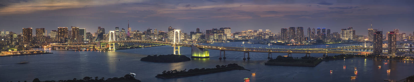 Aerial panoramic view of the Rainbow Bridge crossing northern Tokyo Bay between Shibaura Pier and the Odaiba waterfront development in Minato, Tokyo, Kanto region, Japan. - AAEF26176