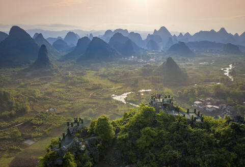 Aerial view of Moon Hill Yangshuo, a scenic hilly landscape, Yangshuo County, Guilin, Guangxi Zhuang Autonomous Region, China. - AAEF26200