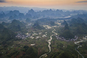 Aerial view of Moon Hill Yangshuo, a scenic hilly landscape, Yangshuo County, Guilin, Guangxi Zhuang Autonomous Region, China. - AAEF26201