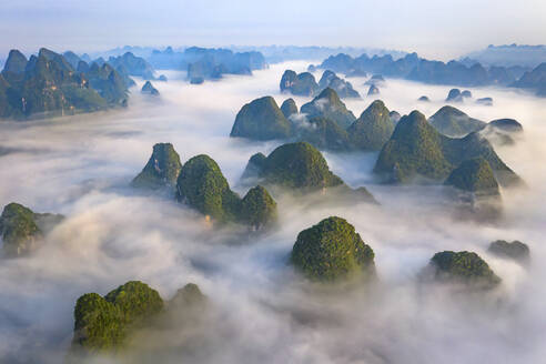 Aerial view of Moon Hill Yangshuo, a scenic hilly landscape, Yangshuo County, Guilin, Guangxi Zhuang Autonomous Region, China. - AAEF26203