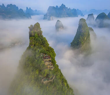 Aerial view of Moon Hill Yangshuo, a scenic hilly landscape, Yangshuo County, Guilin, Guangxi Zhuang Autonomous Region, China. - AAEF26204