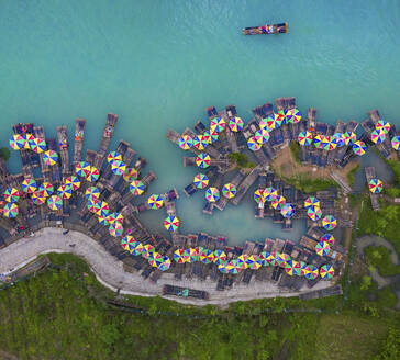 Aerial view of traditional boats along the river in Moon Hill Yangshuo valley, Yangshuo County, Guilin, Guangxi Zhuang Autonomous Region, China. - AAEF26206