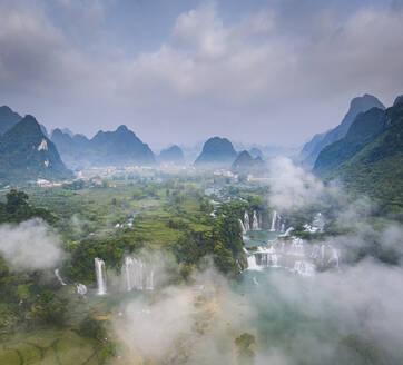 Aerial view of Detian Transnational Waterfalls along the river at Moon Hill Yangshuo valley, Chongzuo City, Yangshuo County, Guilin, Guangxi Zhuang Autonomous Region, China. - AAEF26209
