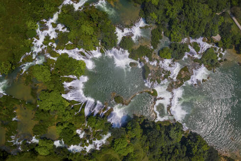 Aerial view of Detian Transnational Waterfalls along the river at Moon Hill Yangshuo valley, Chongzuo City, Yangshuo County, Guilin, Guangxi Zhuang Autonomous Region, China. - AAEF26214