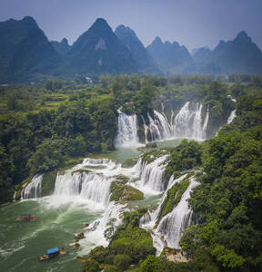 Aerial view of Detian Transnational Waterfalls along the river at Moon Hill Yangshuo valley, Chongzuo City, Yangshuo County, Guilin, Guangxi Zhuang Autonomous Region, China. - AAEF26218