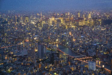 Aerial view of Tokyo skyline at sunset along the Sumida river, Japan. - AAEF26229