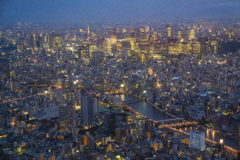 Aerial view of Tokyo skyline at sunset along the Sumida river, Japan. - AAEF26229