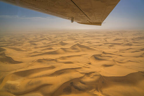 Aerial view of the Namib Desert with sand dunes, view from a plane, Namibia. - AAEF26234