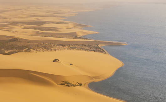 Aerial view of the Namib Desert with sand dunes along the Atlantic Ocean coastline, Namibia, Africa. - AAEF26238