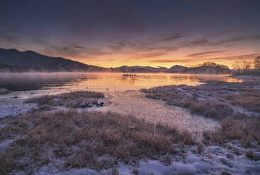 Aerial view of Lake Hibara at sunset, a geothermal and volcanic lake in Bandai-Asahi National Park, Yama District, Fukushima, Japan. - AAEF26265