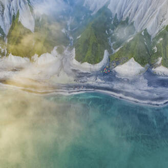 Aerial view of Iturup Island along Sea of Okhotsk coastline, Kuril Archipelago, Sakhalin Oblast, Russia. - AAEF26284