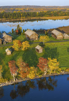 Aerial view of houses along the coast of Kizhi Island, Republic of Karelia, Medvezhyegorsky District, Russia. - AAEF26299