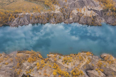 Aerial view of a river with trees in autumn colours in Konduki, Tula region, Russia. - AAEF26369