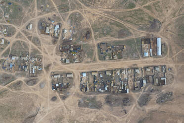 Aerial view of a small village along Elton Lake in Vengelovskoe, Volgograd Oblast, Russia. - AAEF26397