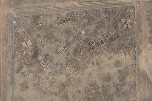 Aerial view of a small cemetery along Elton Lake in Vengelovskoe, Volgograd Oblast, Russia. - AAEF26405