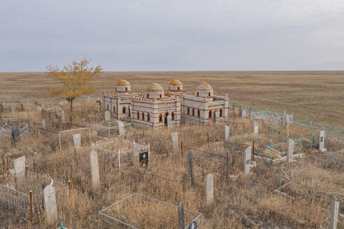 Aerial view of a small cemetery along Elton Lake in Vengelovskoe, Volgograd Oblast, Russia. - AAEF26406