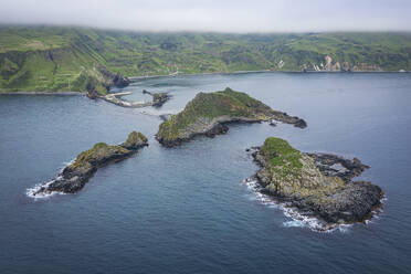 Aerial panoramic view of a pier and promontory on Ostrov Moneron island Nevelsk, Sakhalin Oblast, Russia. - AAEF26429