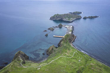 Aerial panoramic view of a pier and promontory on Ostrov Moneron island Nevelsk, Sakhalin Oblast, Russia. - AAEF26430